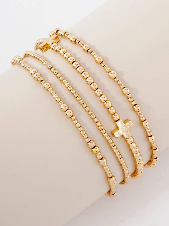 4PC-Set Cross Accents Metallic Beaded Stackable Stretch Bracelet for wholesale by Wild Honey