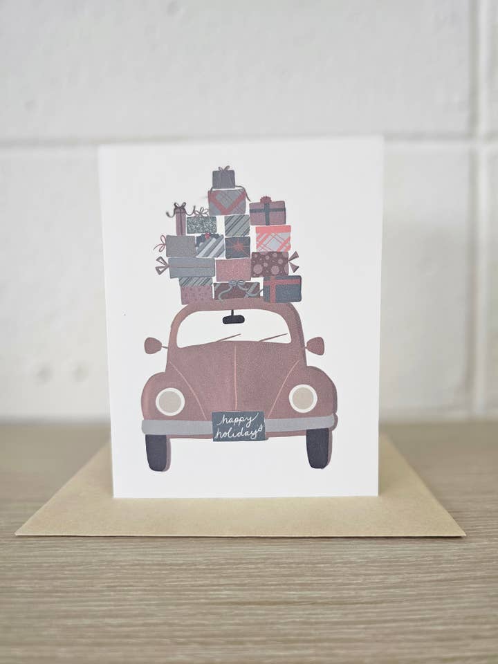 Red Car with Gifts Happy Holidays Greeting Card for wholesale by Covered With Art