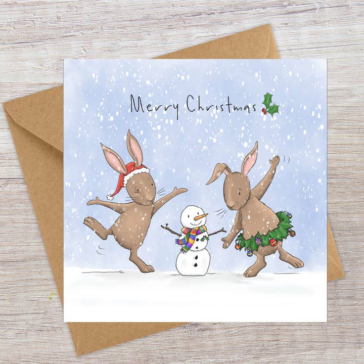Bunnies & Snowman - Christmas card for wholesale by Lucy Driver Illustration