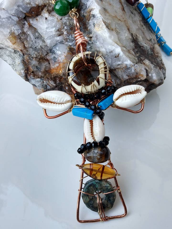 Cowrie Shell Talisman Pendant-Protection Ancestral Grounding for wholesale by Norahz Boutique