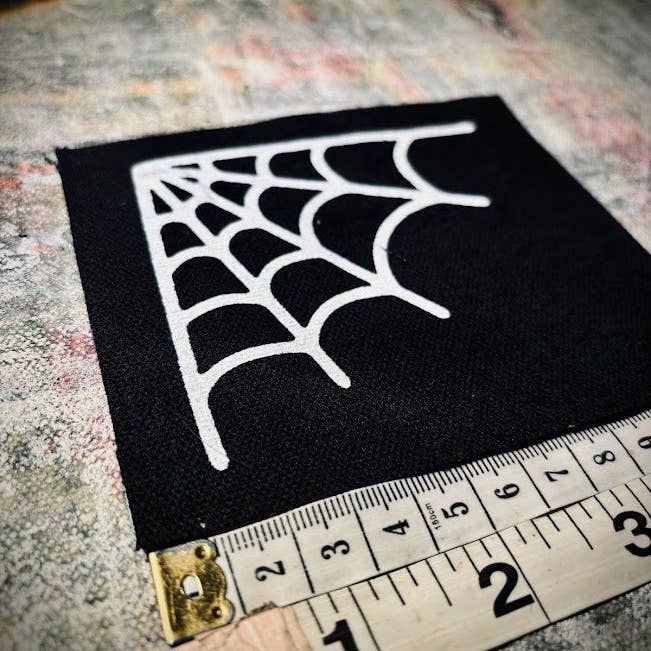 Three Raccoons - Wholesale Patch - Spider Web corner patch.1