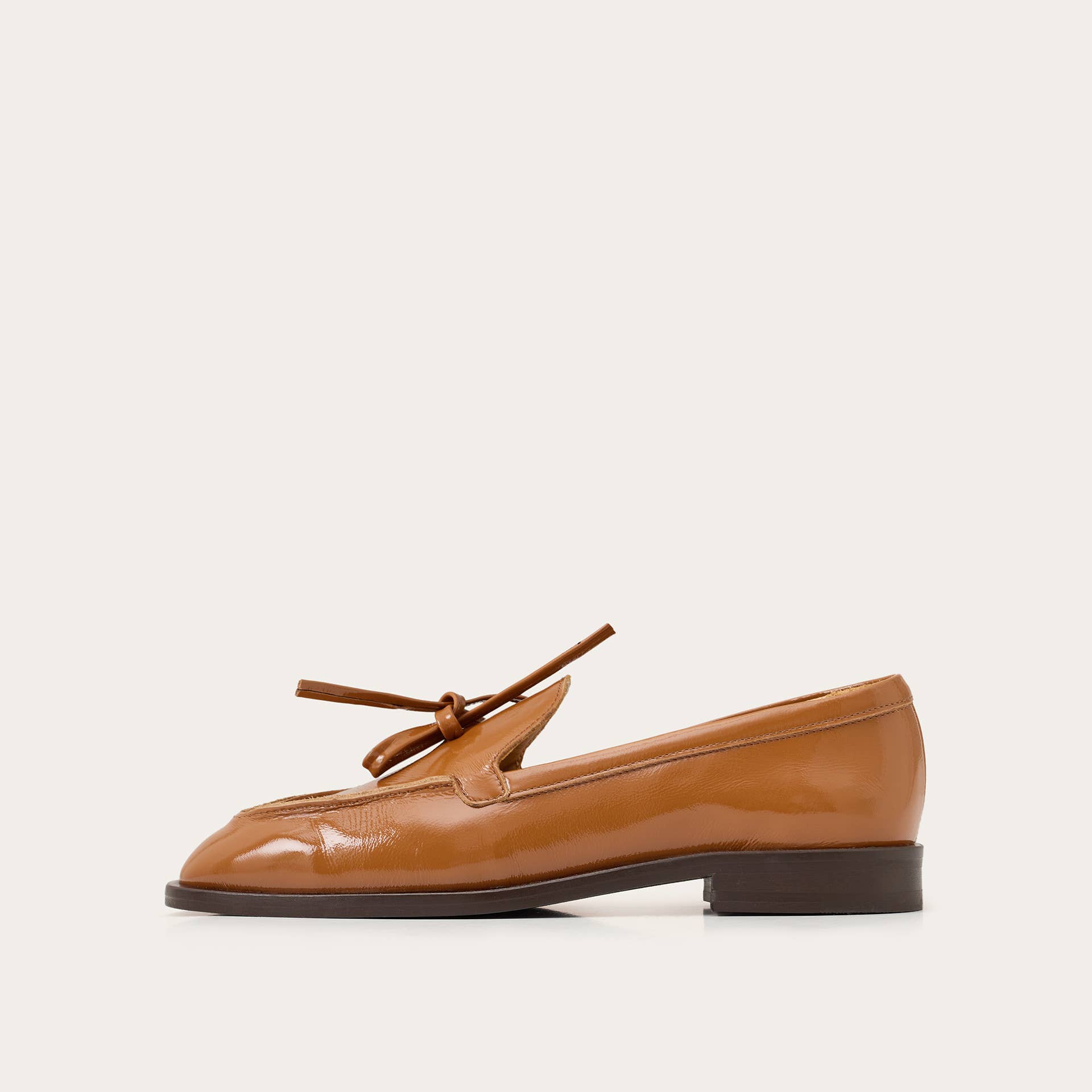 amber Raphael Flats, glossy caramel for wholesale on Faire1