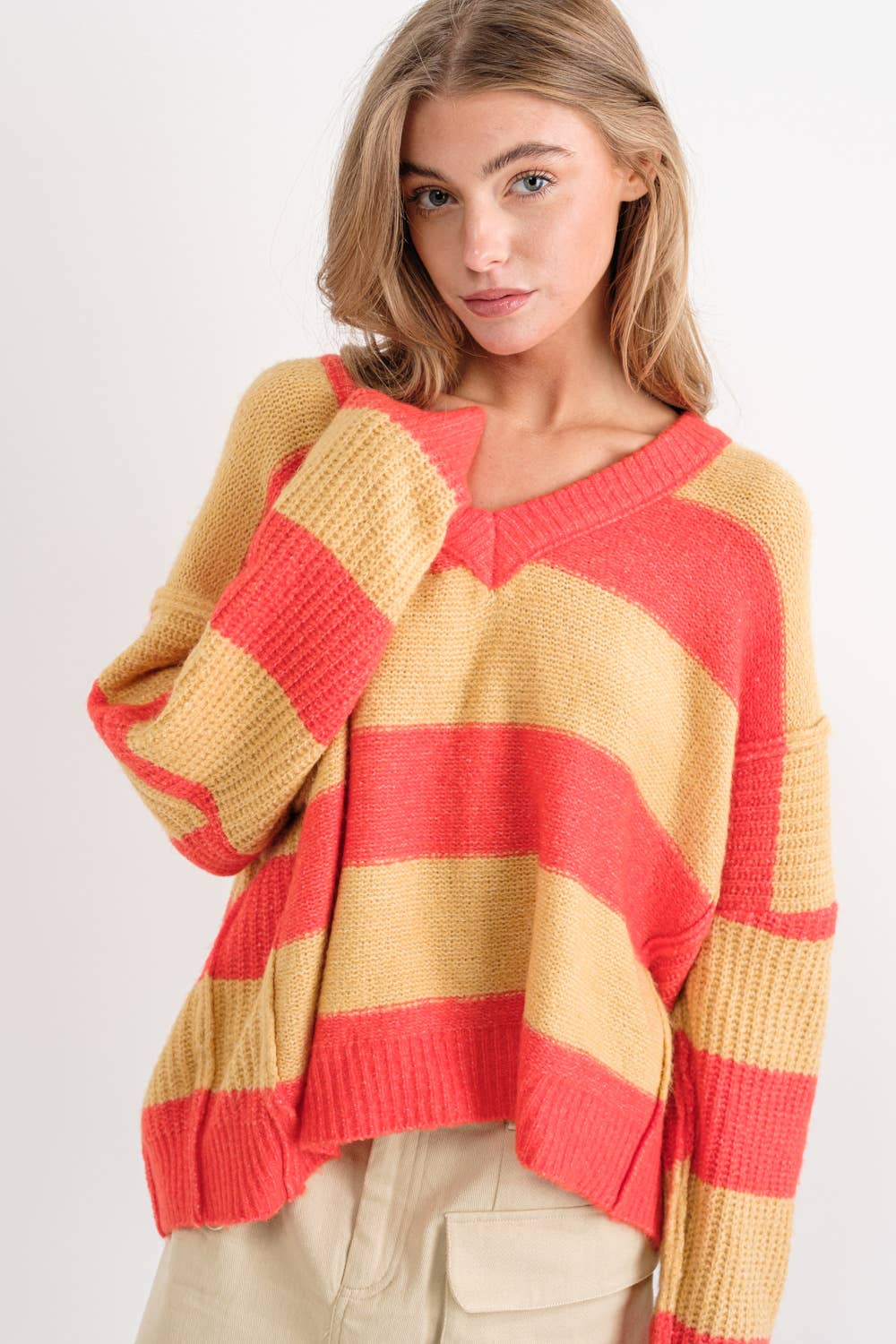 ARANCIO/TORTORA MAGLIONE DOLMAN OVERSIZE A RIGHE CON SCOLLO A V in vendita all'ingrosso su Faire3