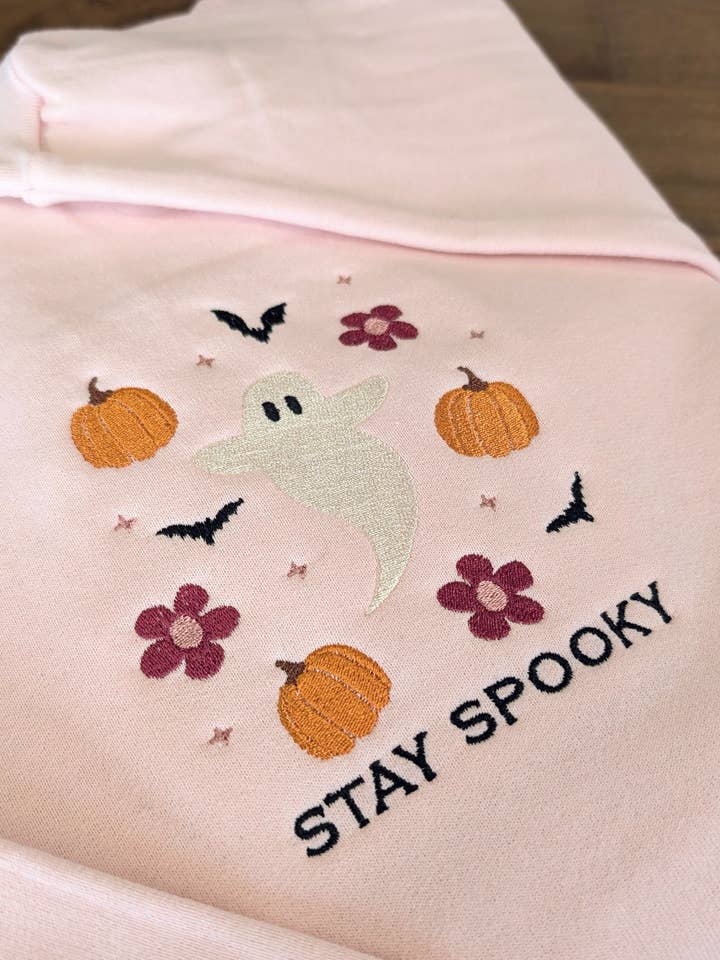 Stay Spooky Retro Floral Ghost Fall Embroidered Sweatshirt for wholesale by Penelope Annen Design