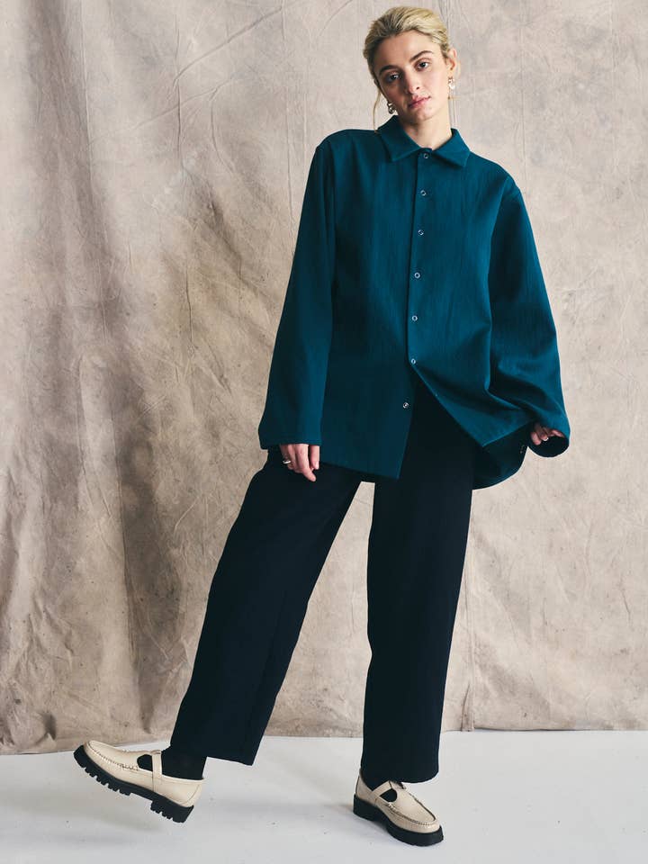 Unisex drukknoopshirt - Katoen- en wolmix voor wholesale door Devlyn van Loon