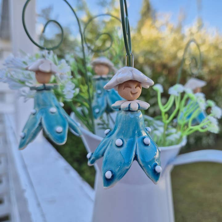 Hanging Turquoise Dotted Flower Fairy/Large,Ceramic Figures for wholesale by Pannonhem AB.