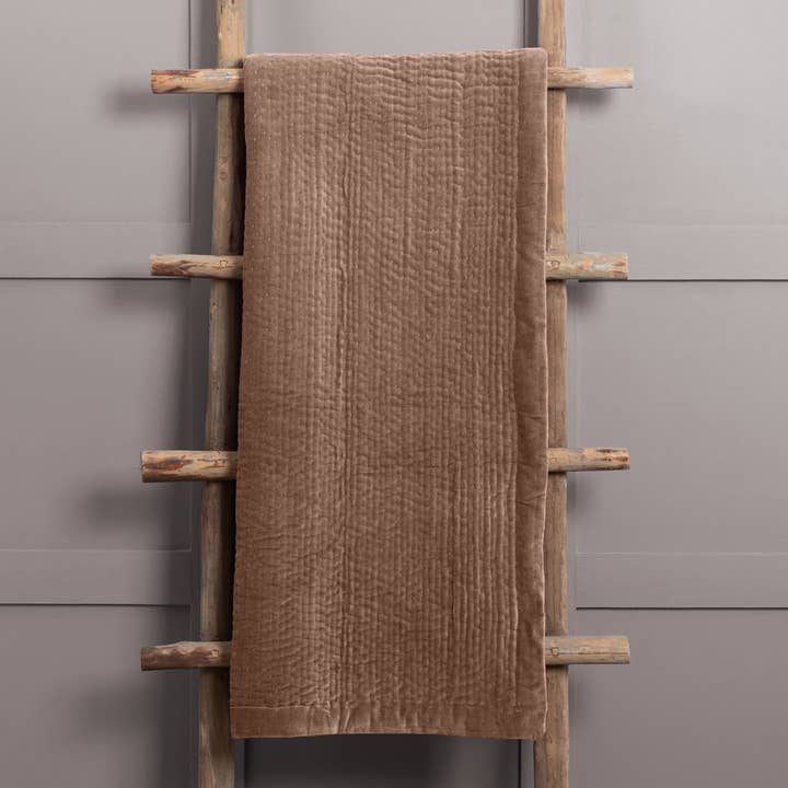 Haze Velvet Quilted Throw Coral for wholesale on Faire