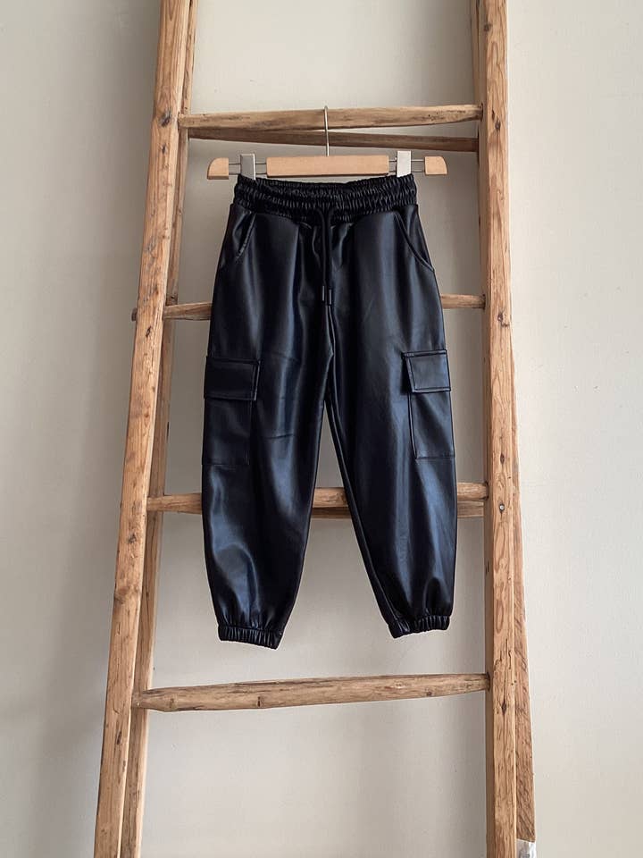 Faux leather jogging pants with pockets FF5876 with BLACK for wholesale by FUNBEE kid Made in Italy