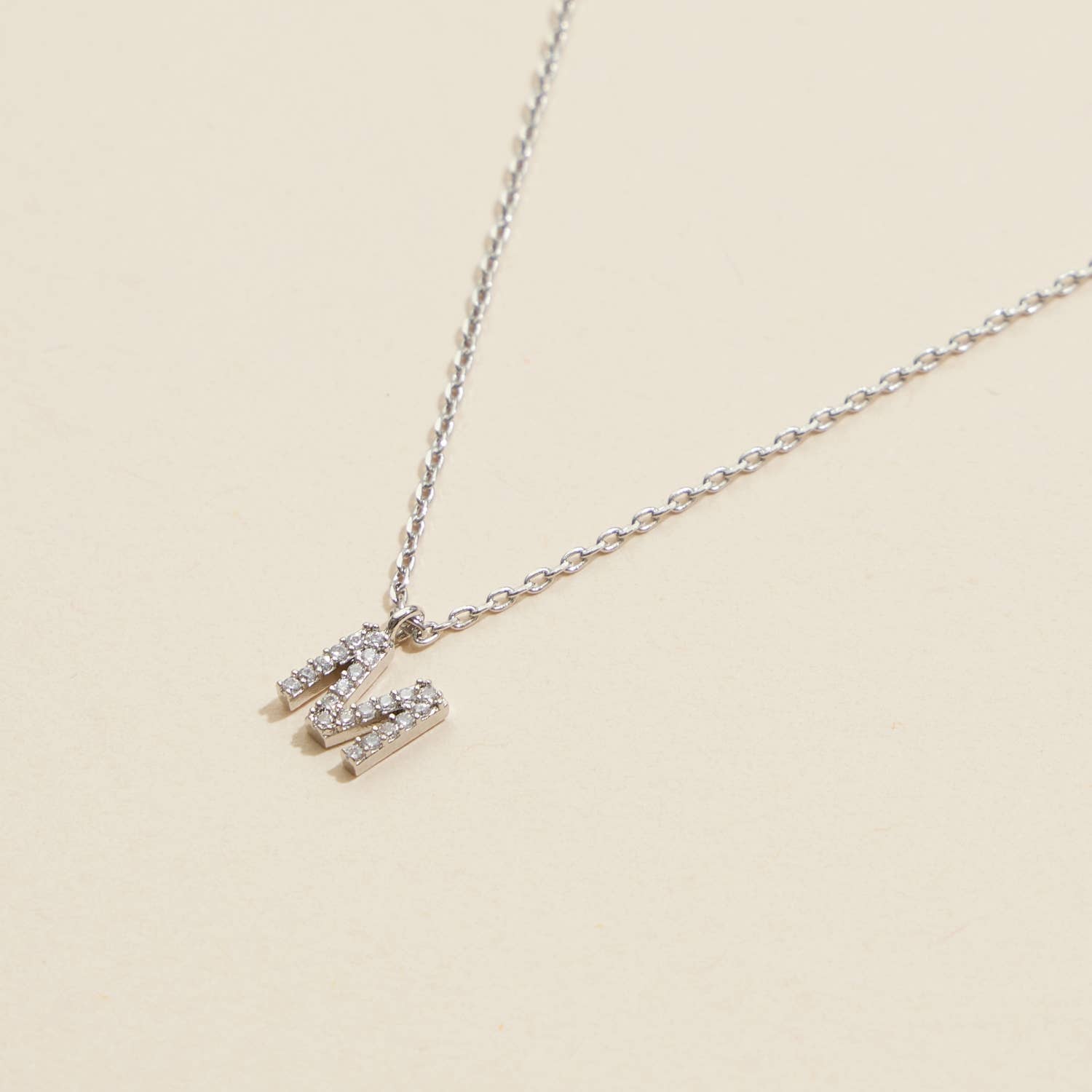 Lilla Haven - Wholesale Pendant/Charm Necklace - 12 Pack of Cubic Zirconia Initial Gold Dipped Necklaces24