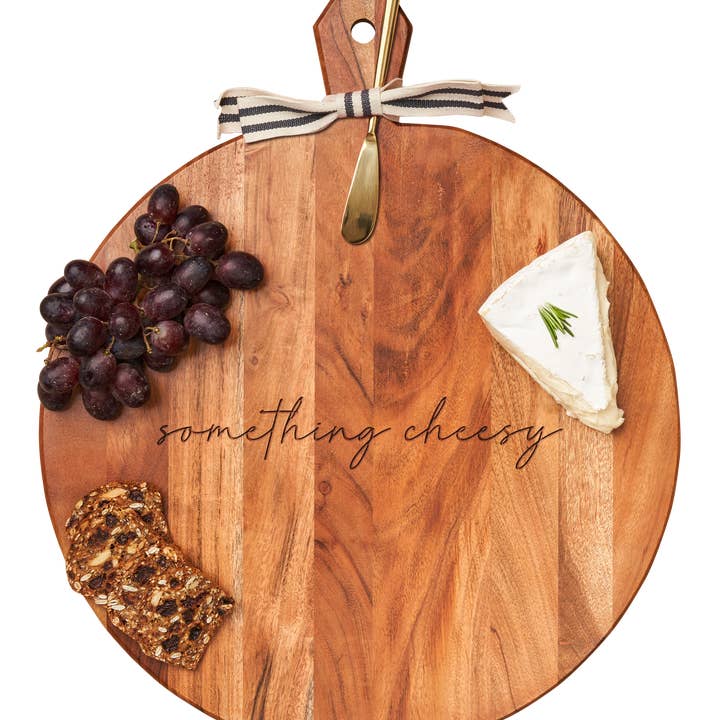 Acacia Heirloom Board with Handle Round & Gold Spreader Tied with Gray & White Ribbon | something cheesy | 20 x 16 x .6" for wholesale by Sophistiplate