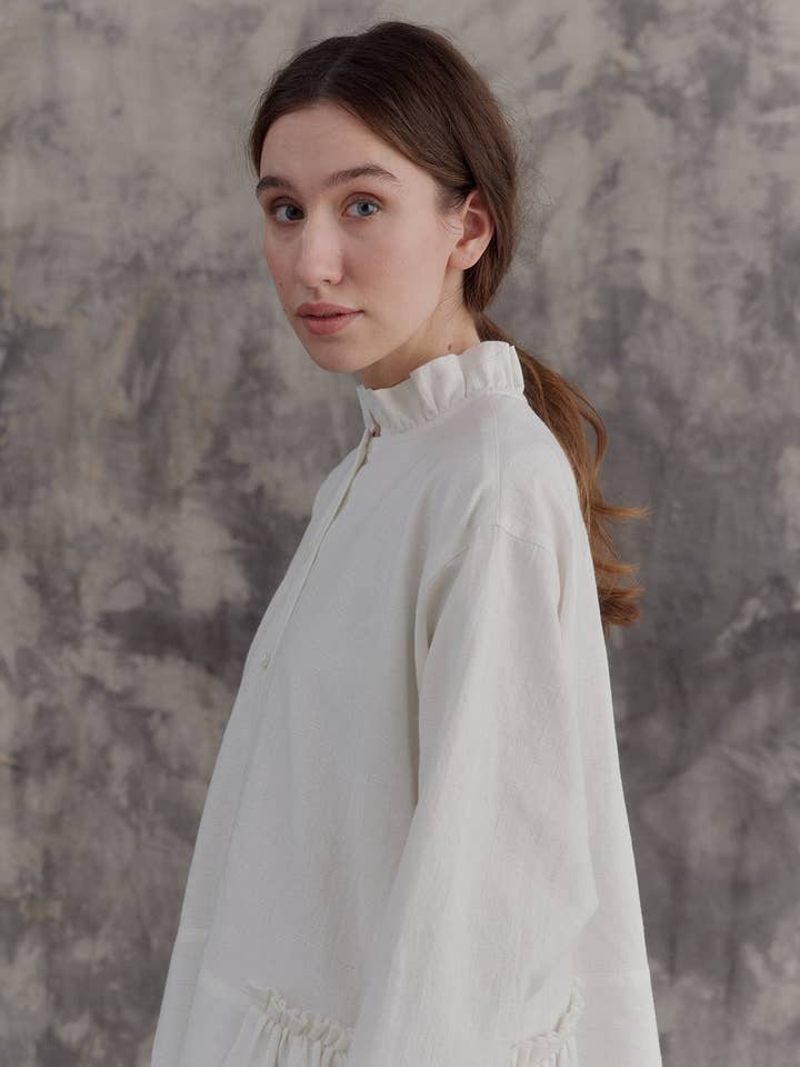 Robe à fronces côté blanc lait pour la vente par muku