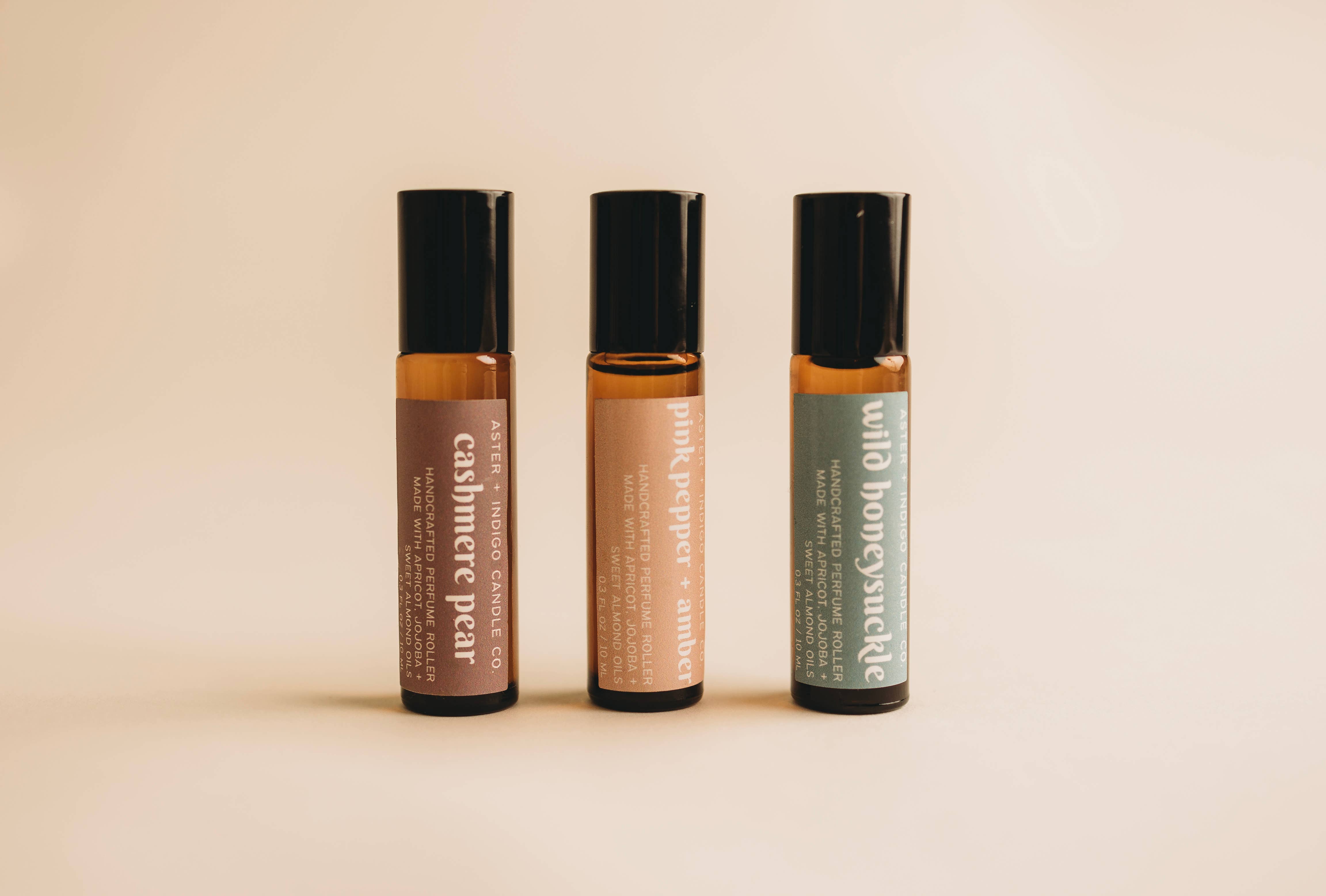 Aster + Indigo Candle Co. - Wholesale Roll-On Fragrance - Pink Pepper + Amber | Perfume Oil Roller1