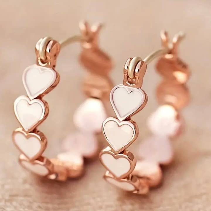 Aros en forma de corazón rosa claro para venta al por mayor de WinAri