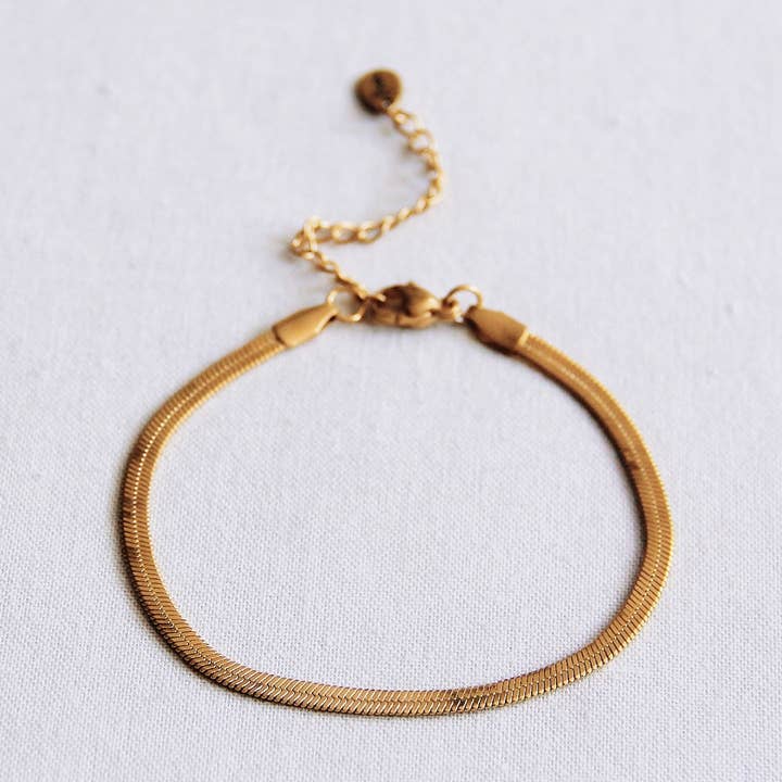 Bazou - Wholesale Schakelarmband - Stalen armband 'platte slang' - goudkleurig0