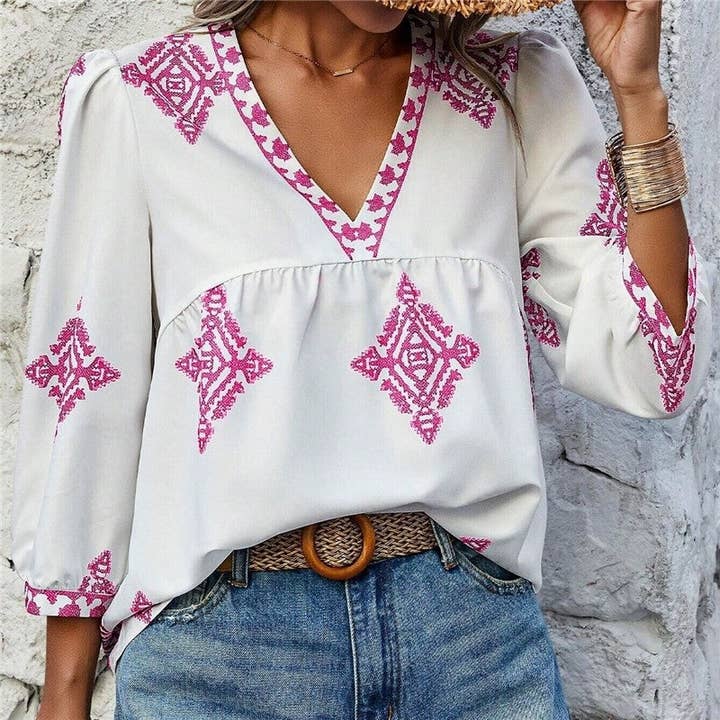 Chemise à col en V à imprimé floral pour la vente par Sheer Trend