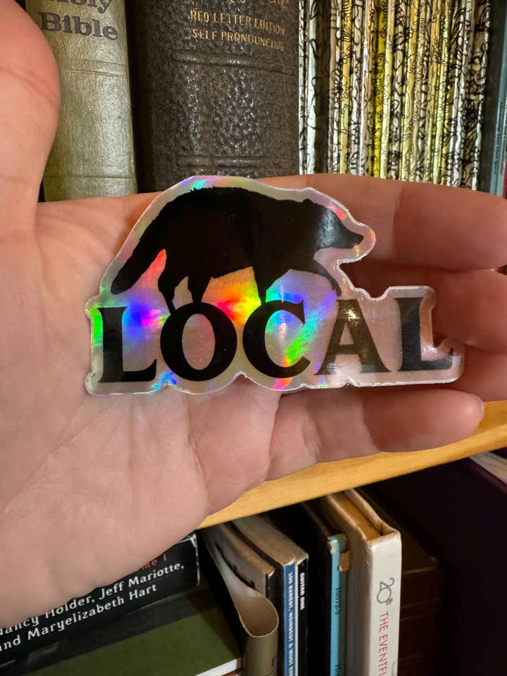 Local Holographic Raccoon Sticker for wholesale by Carolina Pine Prints
