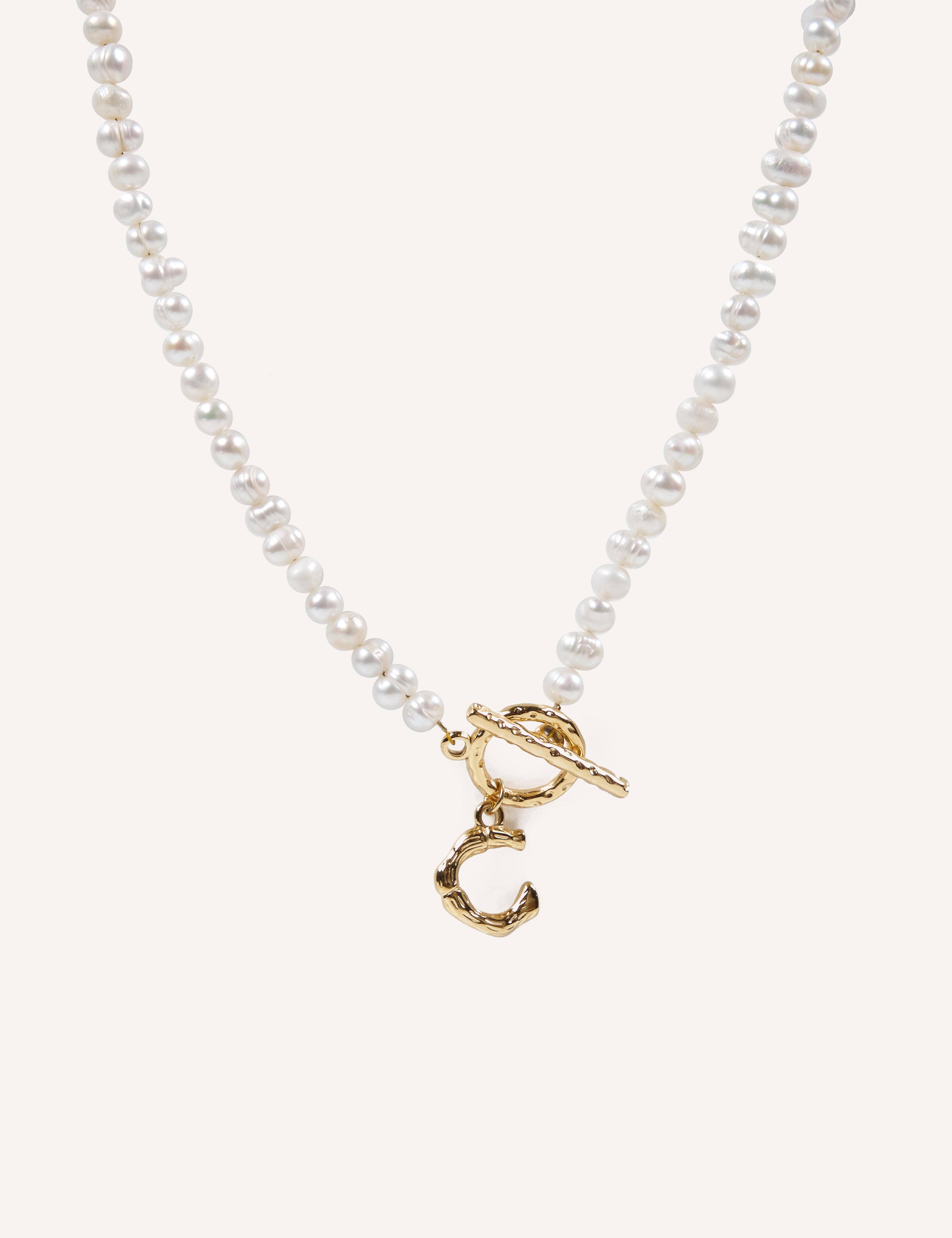 CUCOCUCA - Wholesale Choker/Collar - Handgemaakte parel choker met etnische letter8