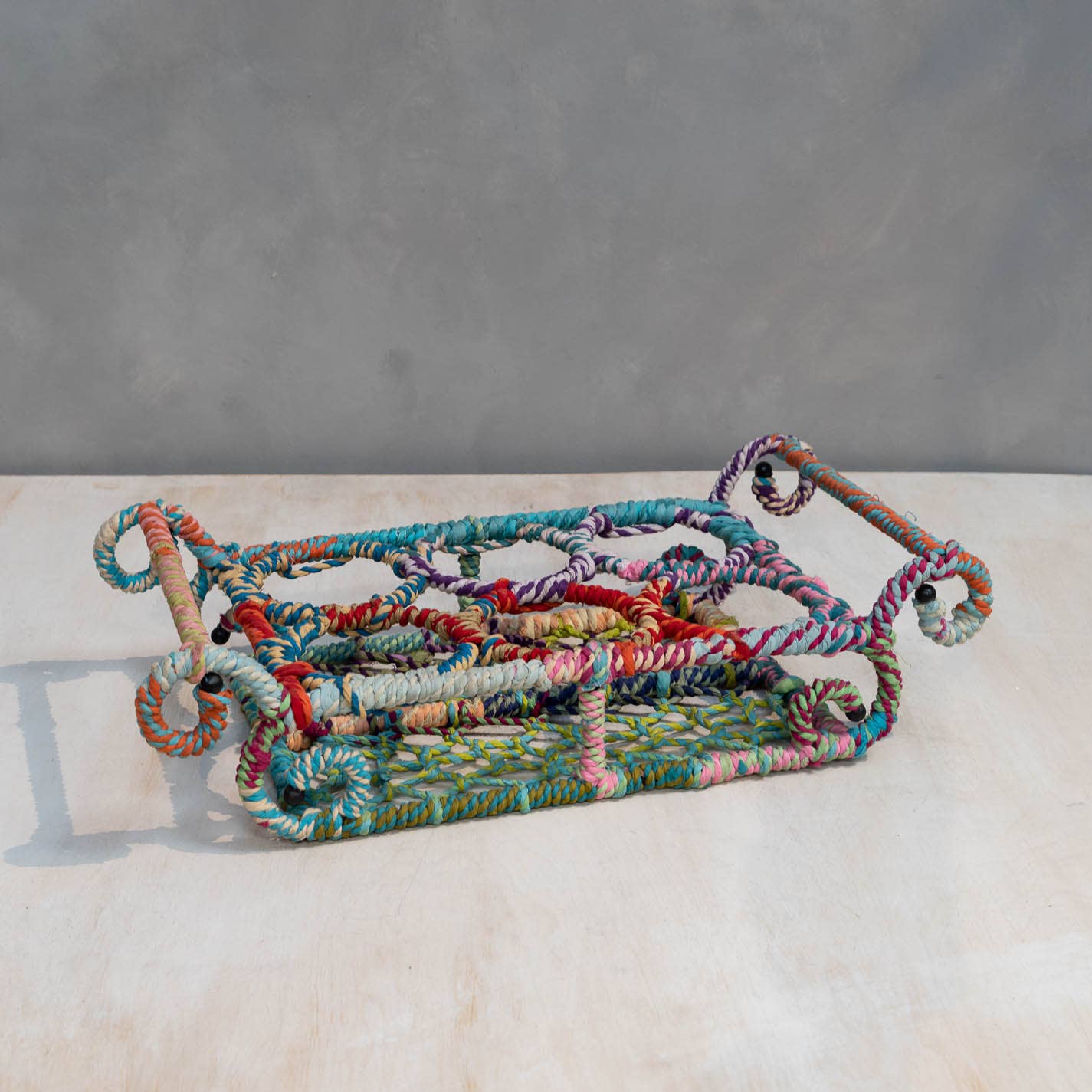 India Handicrafts Inc - Wholesale Bottle Rack/Holder - Iron Wrapped Multi-Color Jute Swirl 6-Bottle Holder1