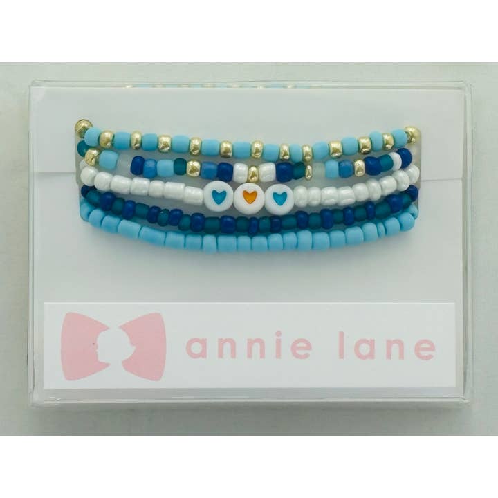 Ensemble de cinq bracelets perlés Annie Lane - bleu des fêtes/or pour la vente par Annie Lane