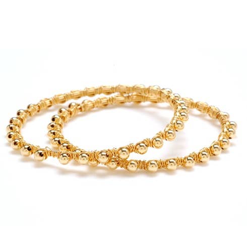 Dos brazaletes dorados para venta al por mayor de Dana Blair Designs