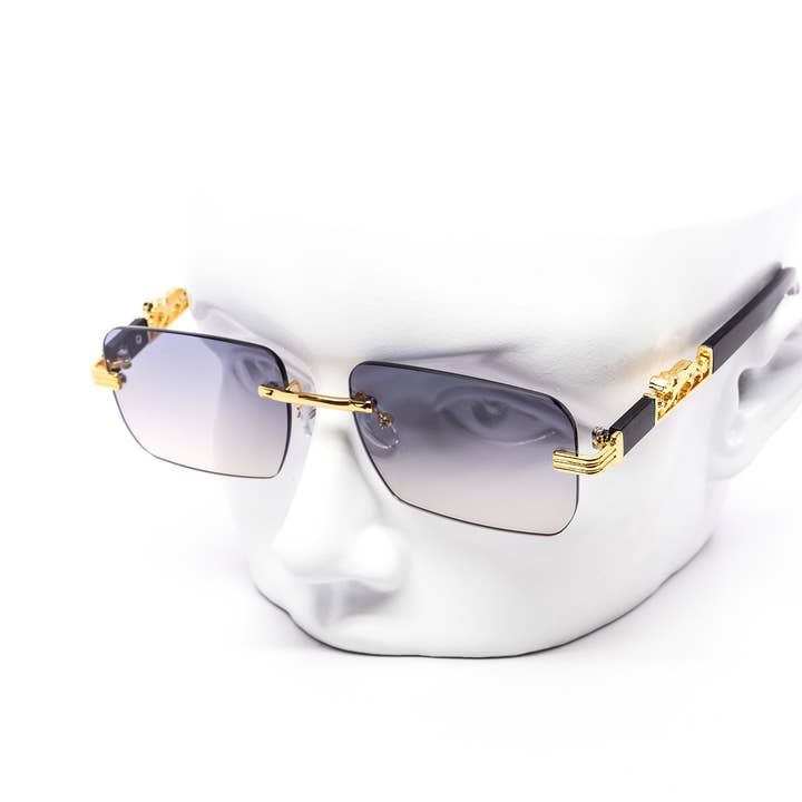 Lunettes de soleil dégradées sans monture avec accent félin pour la vente par Still Friday