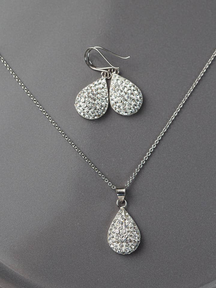 Swarovski Crystal Round Teardrop Silver Earrings for wholesale by Annie and Sisters