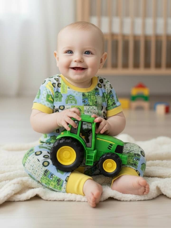 Little man" Tractor printed boys baby romper w/yellow trim. SR100108-SOL for wholesale by Kids Charm Online