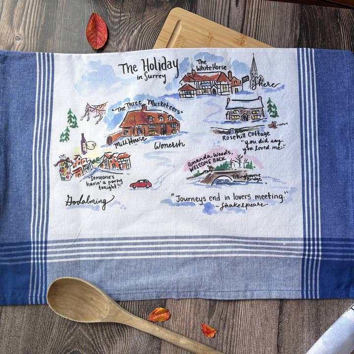The Holiday Movie Tea Towel for wholesale by Kathryn Holeman Illustrations