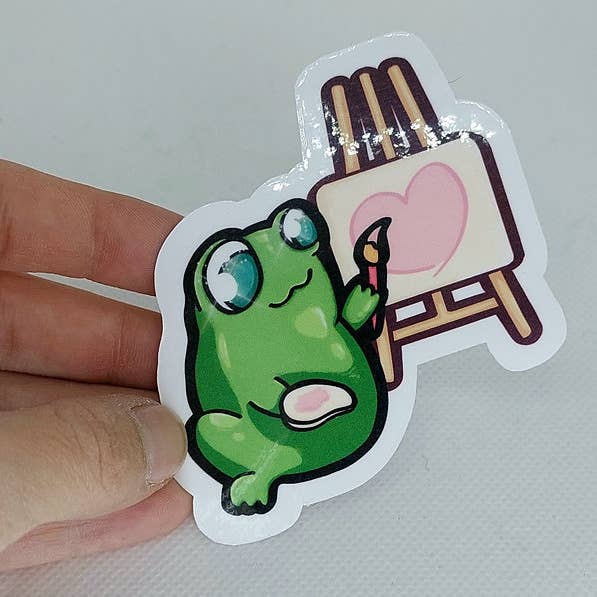 Painting Frog with Easel - 3 inch Sticker for wholesale by Glitter Ghost Clothing and Accessories