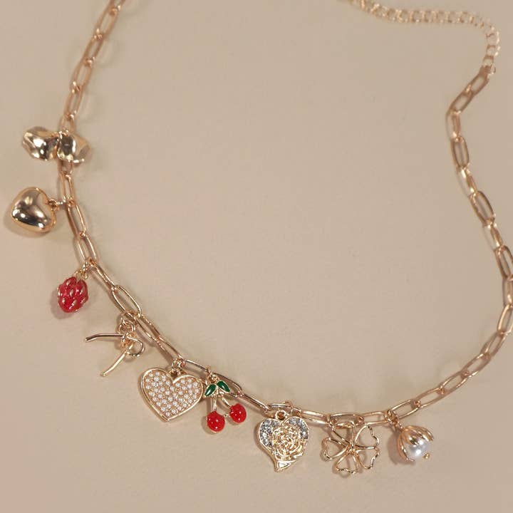 Gold MULTI CHARM BOW CHERRY HEART NECKLACE | 80N1190 for wholesale on Faire2