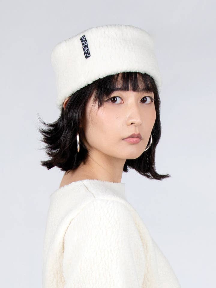 Shearling Pelican 2 en 1 en marfil para venta al por mayor de Paridaez