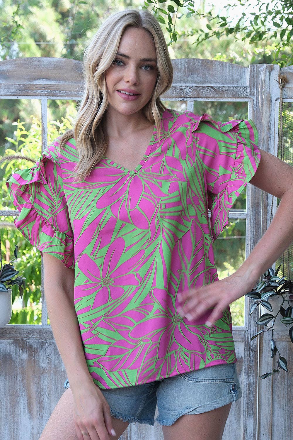 FUCHSIA GREEN ST2407-E - PRINTED WOVEN  RUFFLED TULIP SLEEVE V NECK TOP  for wholesale on Faire2