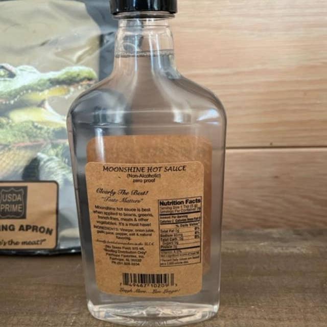 Fairhope Favorites, Inc. – Engroshandel Hot sauce – Swamp Dew Moonshine Hot Sauce Stor - Original1