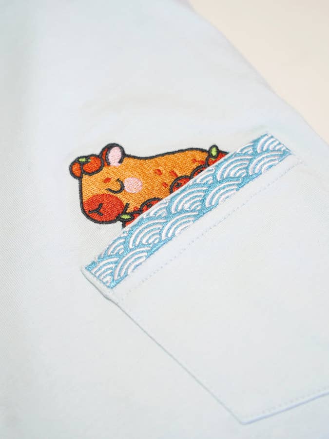 Bathing Capybara Embroidered Pocket Tee | Sky Blue for wholesale by Jessthechen
