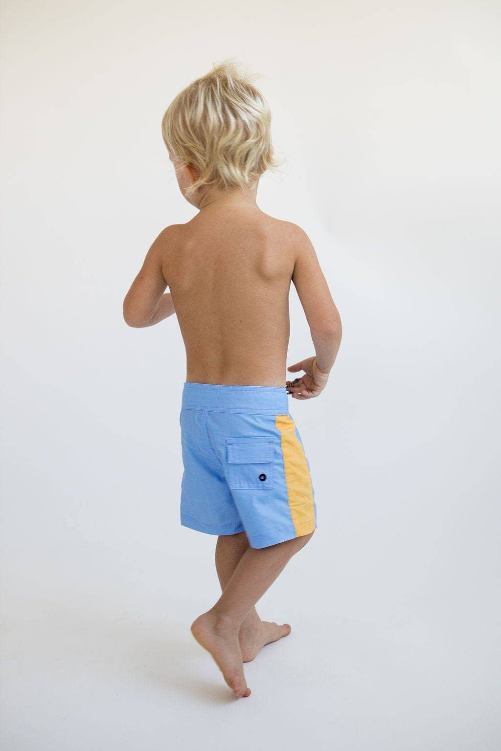 Kid’s Boardshorts in Light Blue and Yellow Colorblock Patch for wholesale on Faire6