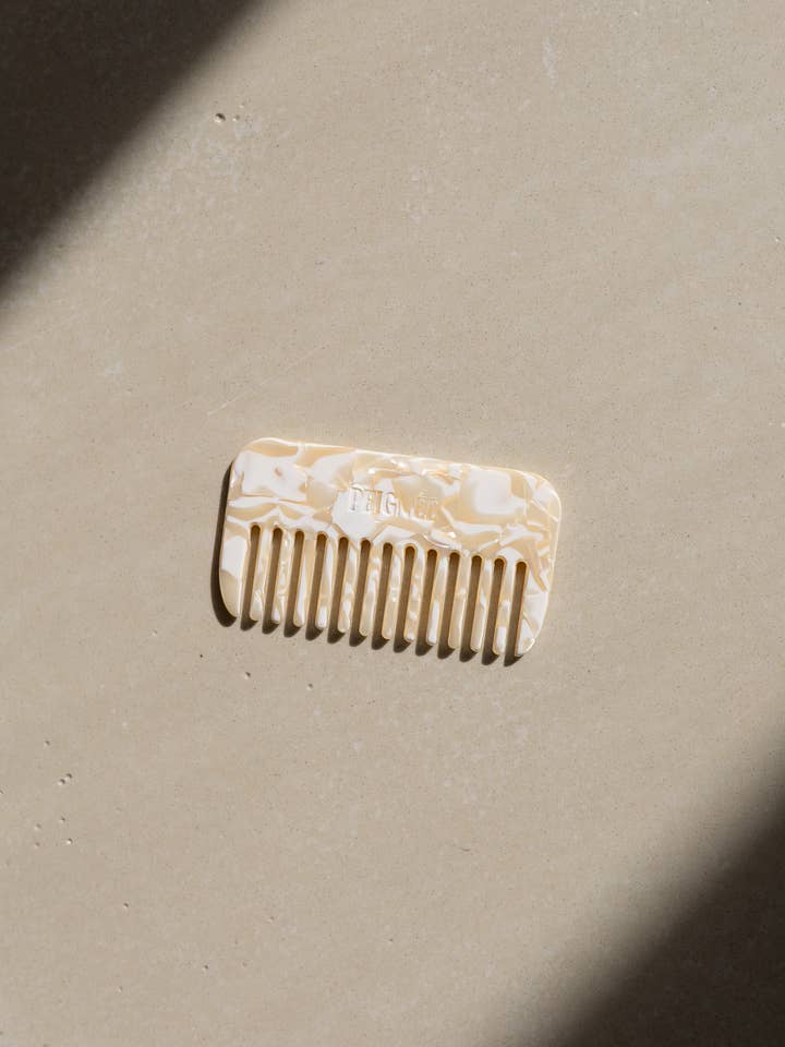 Pettine da viaggio in madreperla per la vendita all'ingrosso da parte di Peignee Paris