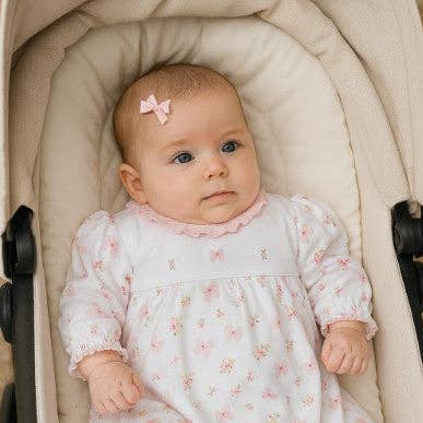 Strikjes & Bloemen Print Babyjurk voor wholesale door Marco and Lizzy