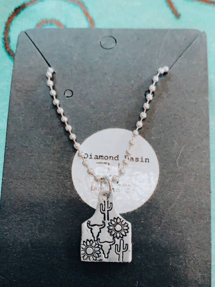 Cowgirls dream cow tag necklace for wholesale by Diamond Basin Design Co.