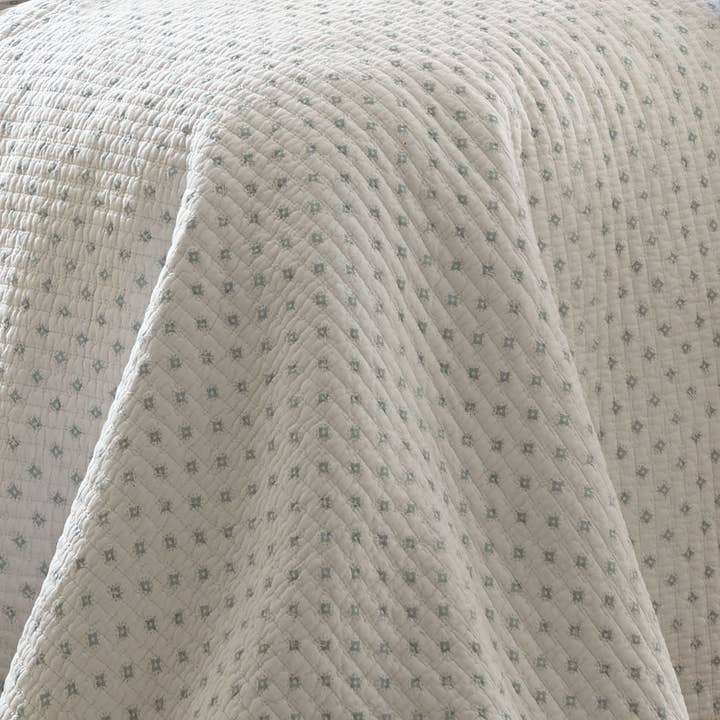 White Ditsy Spa Quilt Set for wholesale on Faire