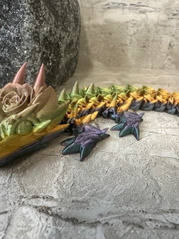 Baby Rose Dragon for wholesale by Studio 23 Designs