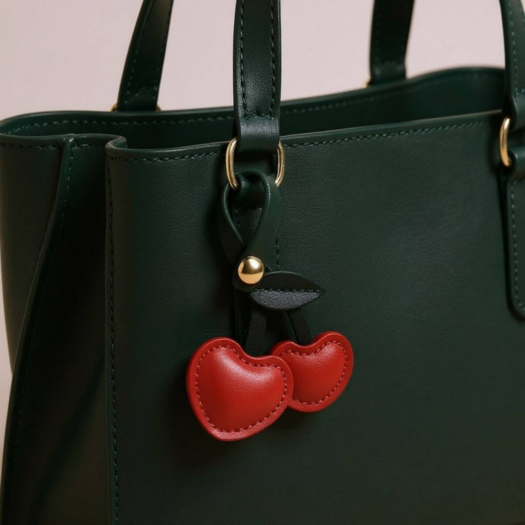 Red Faux Leather Cherry Heart Keychain with Black Leaf Strap and for wholesale on Faire1