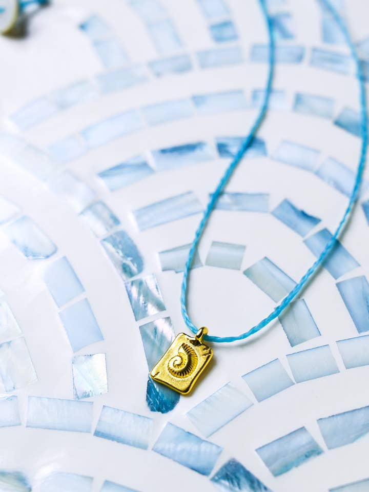 18k Gold Nautilus Shell Tag Charm Necklace, Sea Life Jewelry for wholesale by Jasmine Sol Jewelry