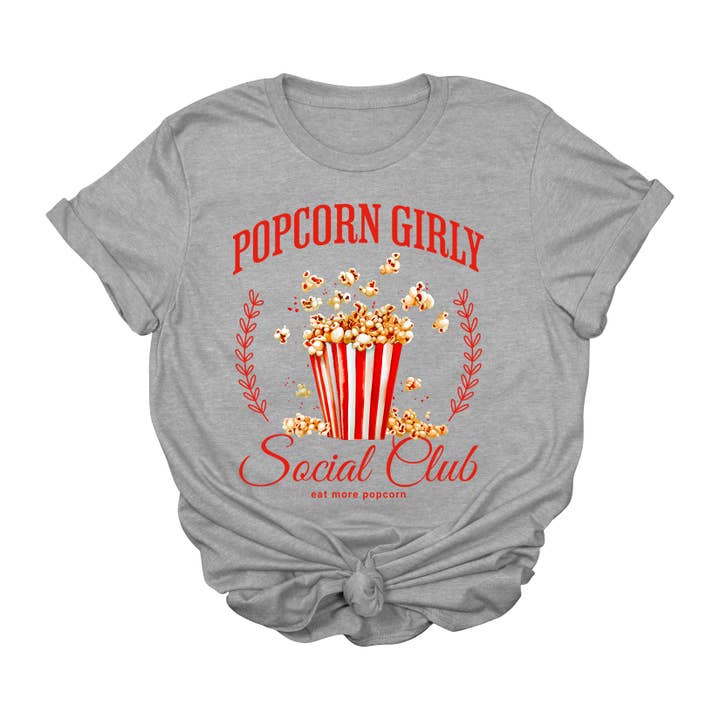 House of Savvy - Wholesale T-shirt (graphic) – women's - Popcorn Girly Graphic T-Shirt | Movie Night Social Club Tee | Cute Snack Lover Shirt | Retro Cinema Graphic Tee for Women | Funny Popcorn Aesthetic T-Shirt | Cozy Film Night Gift Shirt1