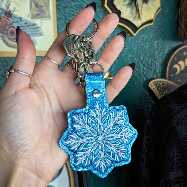 Turquoise Holo Snowflake Embroidered Keychain - Holographic Vinyl with Silver Hardware for wholesale by Project Pinup