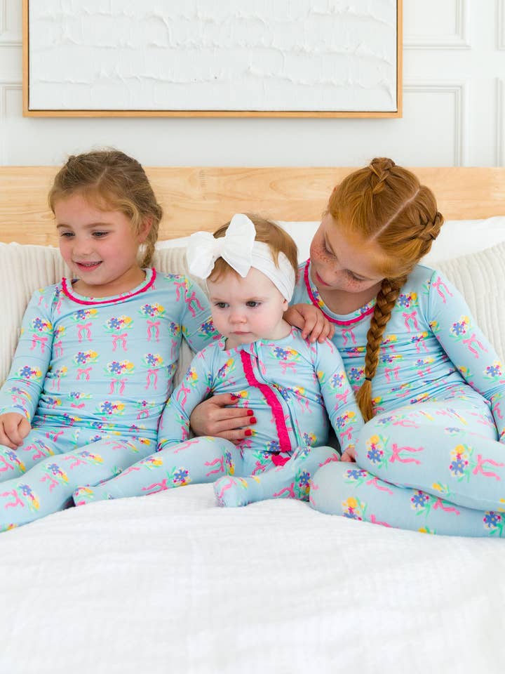 Blue SoftSnooze™ Toddler Girls Bamboo Viscose Bows and Bouquets Ruffle Long Sleeve Pajama Set with Signature Rear Ruffles
for wholesale on Faire2
