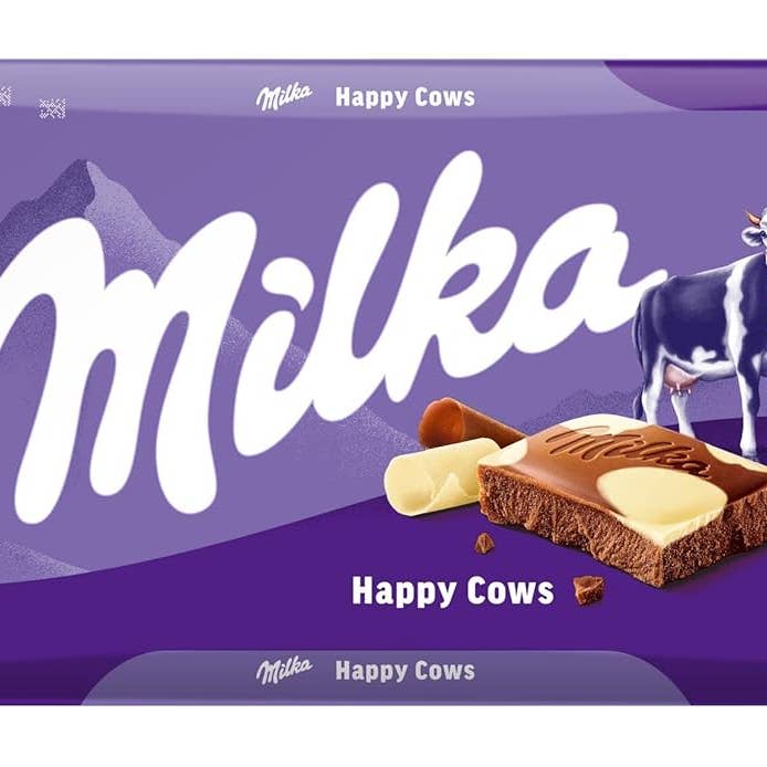 Phoenix Distributions - Venta al por mayor Chocolate - MILKA - Happy Cow, 100 gramos, 23 unidades