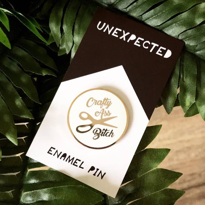 Crafty Ass Bitch Enamel Pin for wholesale by Unexpected Flair