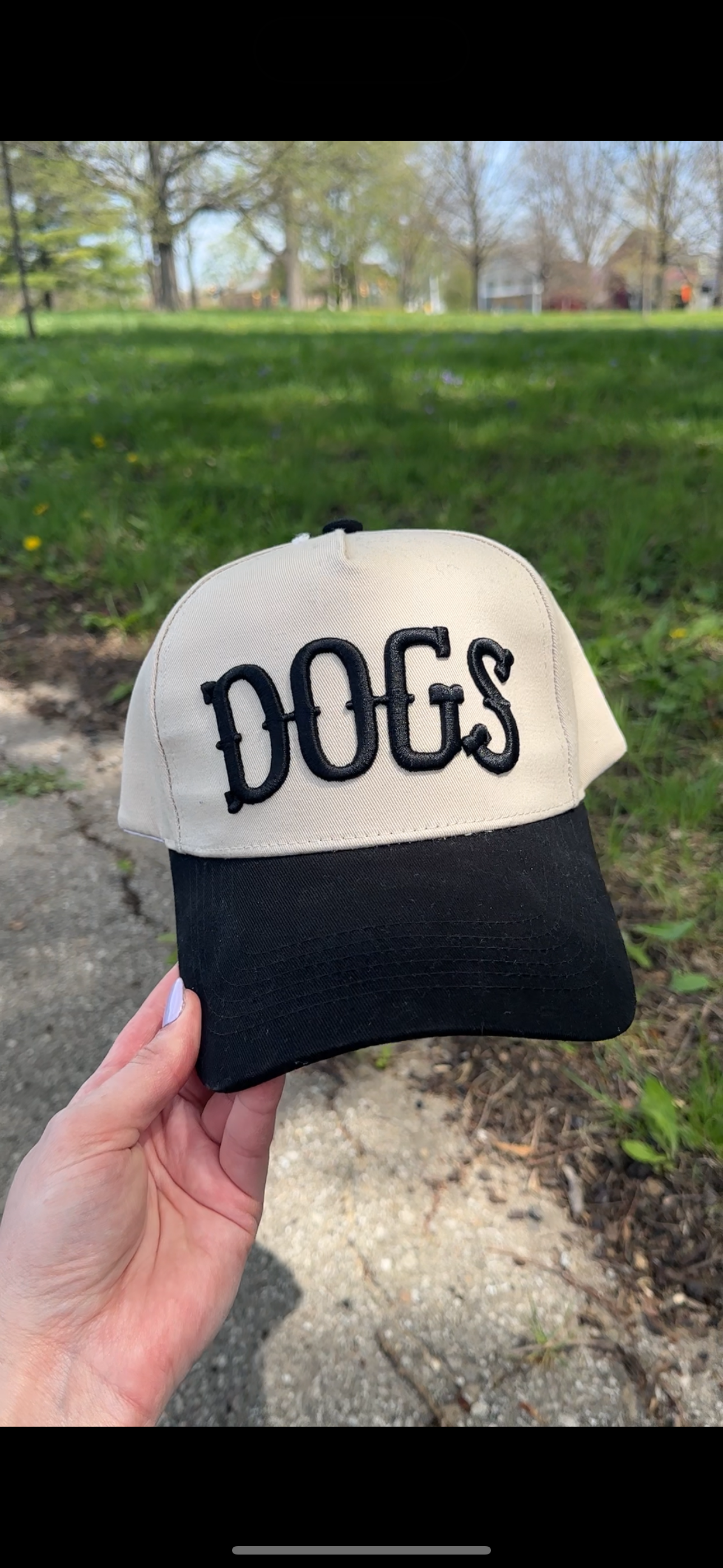 DOGS Embroidered Trucker Hat - Black and Tan Cap for wholesale on Faire2