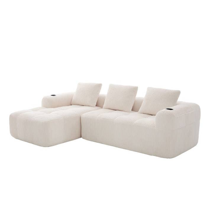 Modulopbygget hjørnesofa med 3 pladser i råhvid fløjl – premium komfort, sidelommer og kopholdere ECLIPSEBAND for engroshandel hos Urban Meuble