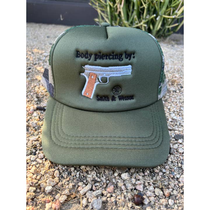 Body Piercing by Smith and Wesson Camo Trucker Hat for wholesale by Free Spirit